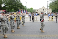 The U.S. Army North Marching Band participated in the 2013 Battle of Flowers Parade April 26, at the Alamo Plaza San Antonio Texas. (U.S. Air Force photo by Benjamin Faske) (released)