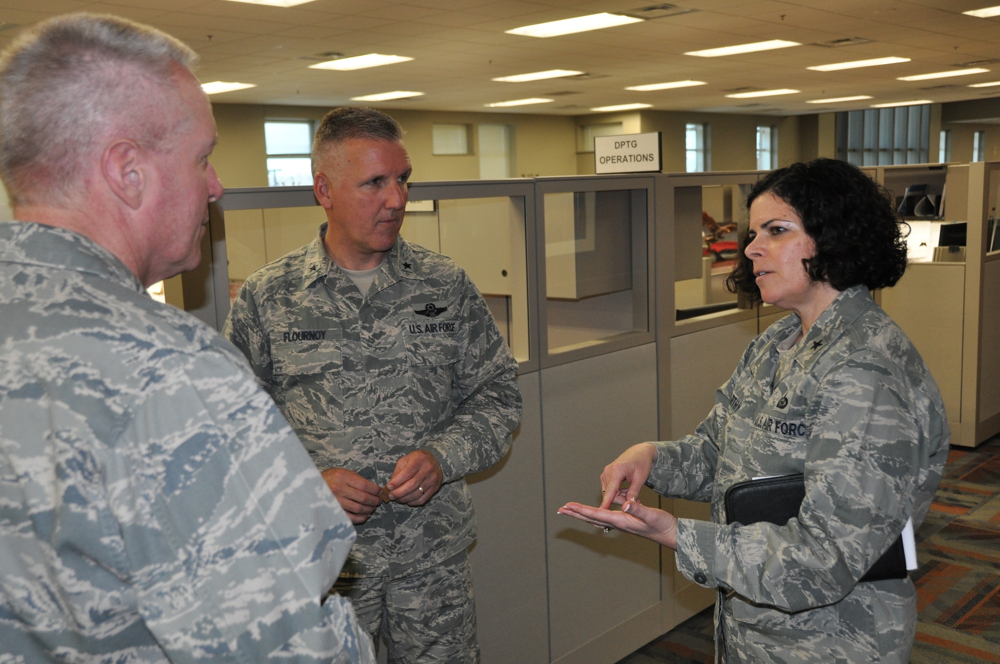Brig. Gen. Muriel McCarthy, Reserve deputy to the assistant secretary of the Air Force for manpower and Reserve affairs, speaks to Brig. Gen. Jay Flournoy, Air Reserve Personnel Center commander, and Col. Thomas Shetter, Air National Guard advisor to the commander, during her tour of ARPC April 29, 2013,on Buckley Air Force Base, Colo. McCarthy is responsible for the oversight of manpower, military and civilian personnel, Reserve component affairs, and readiness support for the department of the Air Force. (U.S. Air Force photo/Tech. Sgt. Rob Hazelett)