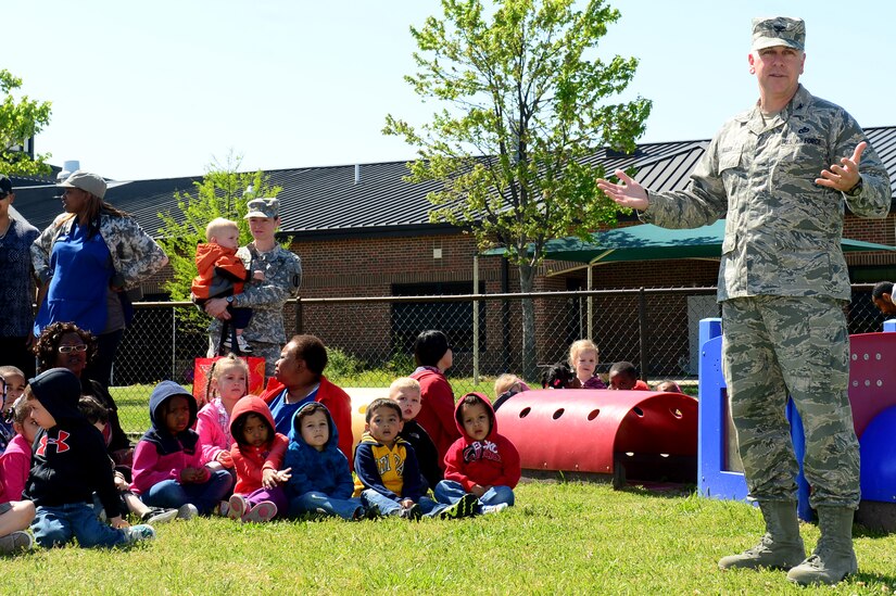 U.S. Air Force Col. John J. Allen Jr., 633rd Air Base Wing commander, speaks to military children during a tree planting ceremony at Langley Air Force Base, Va., April 25, 2013. Children from the Langley Child Development Center participated in this event to celebrate Earth Day and Arbor Day.  (U.S. Air Force photo by Senior Airman Kayla Newman/Released)