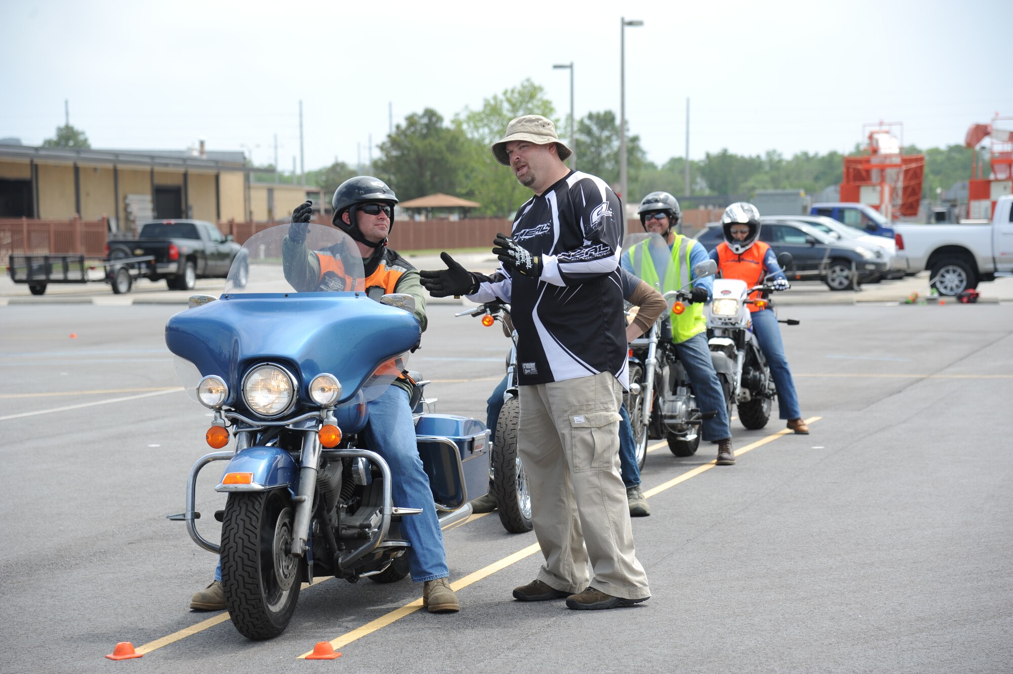 Tech. Sgt. Jason Sharp, 403rd Maintenance Squadron, receives driving instruction from Randy Logan, 338th Training Squadron and motorcycle safety course instructor, during a motorcycle safety course April 18, 2013, at Keesler Air Force Base, Miss.  The course is offered two times a month and teaches students the basic operating skills and safety rules for riding a motorcycle on the road.  (U.S. Air Force photo by Kemberly Groue)