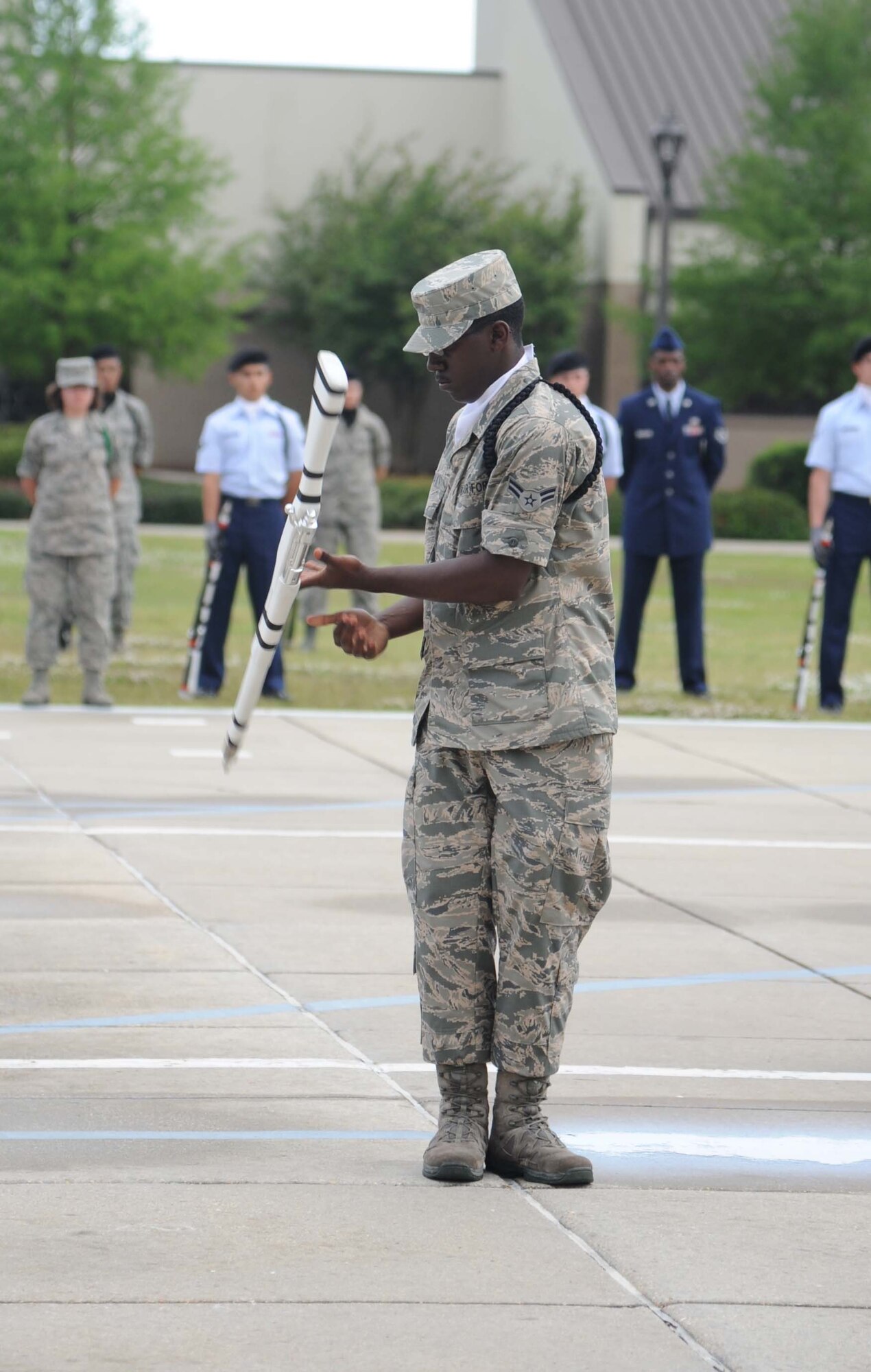 Airman 1st Class Kantrell Gray, 334th Training Squadron, performs in the freestyle drill competition during the 81st Training Group drill down performance April 24, 2013, at Keesler Air Force Base, Miss.  The 334th Training Squadron placed second in open ranks and overall, and placed third in regulation and freestyle.  (U.S. Air Force photo by Kemberly Groue)
