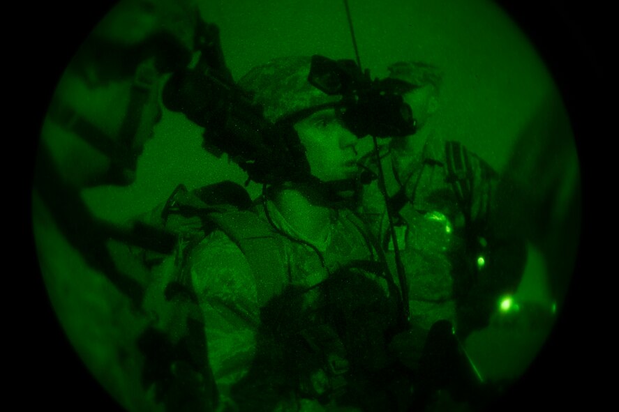 U.S. Air Force Capt. Brandon McKinnon, 820th Combat Operations Squadron director of operations, discusses mission specifics with his team during a training exercise April 24, 2013, at Moody Air Force Base, Ga. During the exercise, an Air Combat Command inspector general team evaluated the 820th COS and 824th Base Defense Squadron on their abilities to perform mission-essential tasks. (U.S. Air Force photo by Staff Sgt. Jamal D. Sutter/Released)