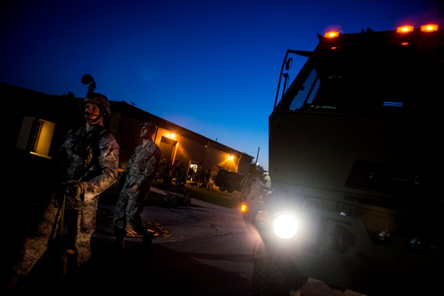 Airmen from the 824th Base Defense Squadron and 820th Combat Operations Squadron prepare to conduct a training mission April 22, 2013, at Moody Air Force Base, Ga. During the exercise, the Airmen trained on mission-essential tasks as they took control of the base’s airfield and provided 360-degree perimeter security around the flightline. (U.S. Air Force photo by Staff Sgt. Jamal D. Sutter/Released) 