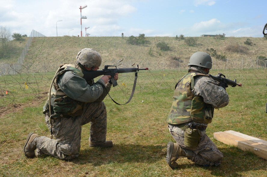 SPANGDAHLEM AIR BASE, Germany – U.S. Air Force Airmen fire blanks upon mock enemy forces during a combat readiness training course April 20, 2013. The Airmen encountered obstacles and training scenarios during the exercise to better prepare them for any real-world contingency operations. (U.S. Air Force photo by Airman 1st Class Kyle Gese/Released)  
