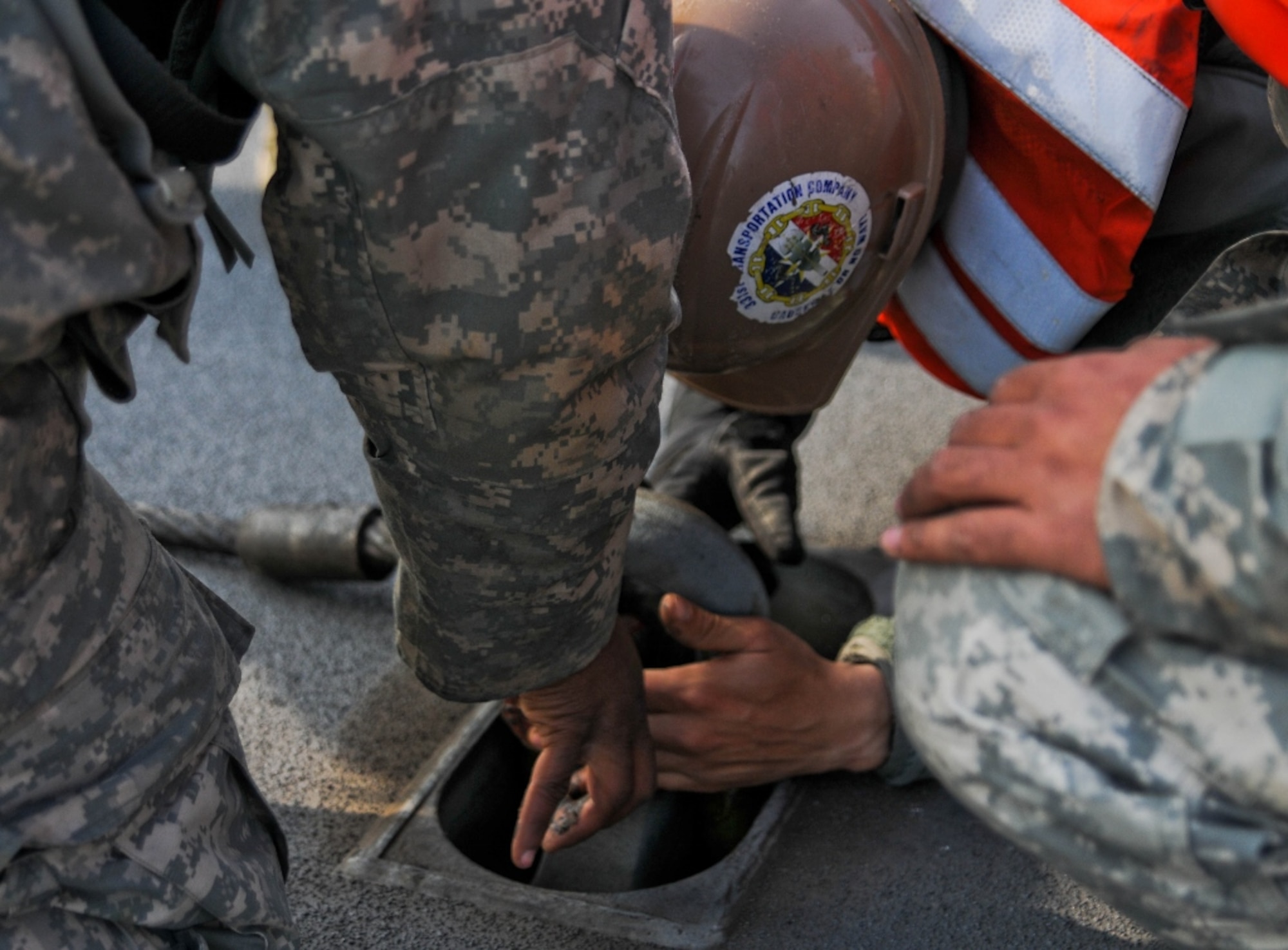 U.S. Army Soldiers assigned to the 331st Transportation Company, 7th Sustainment Brigade from Fort Eustis, Va., set up a modular causeway system on Dogu Beach near Pohang, South Korea, April 14, 2013. All branches of the U.S. military and members of the South Korean military are involved in the Combined Joint Logistics Over-the-Shore exercise. (U.S. Army photo by Sgt. Candace Le/Released)