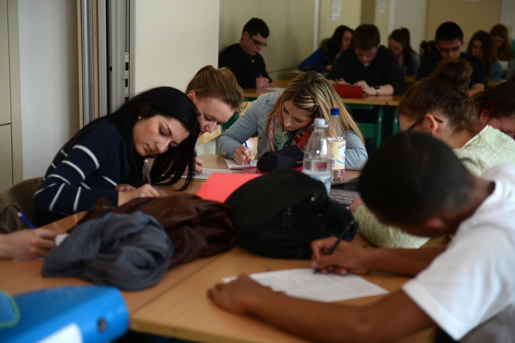 BITBURG, Germany – American and German high school students study English together during a school exchange program April 22, 2013. Along with mixing cultures, the program allowed the students to build friendships. (U.S. Air Force photo by Airman 1st Class Gustavo Castillo/Released)