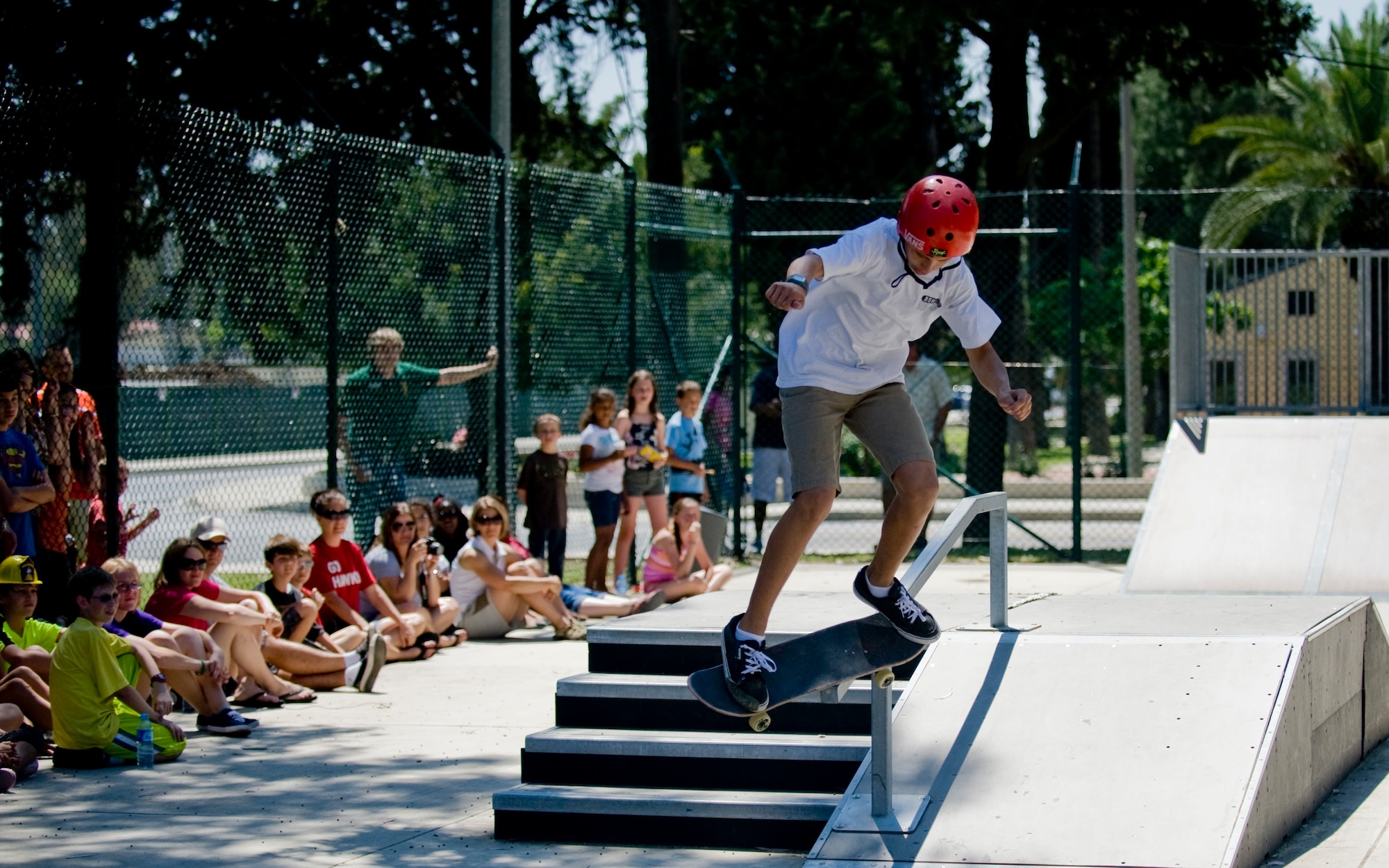 A contestant in the skate board competition grinds down a rail during Spring-A-Palooza April 27, 2013, at Incirlik Air Base, Turkey. The grand finale event Spring-A-Palooza is held to celebrate the Month of the Military Child at. (U.S. Air Force photo by Staff Sgt. Veuril McDavid/Released)