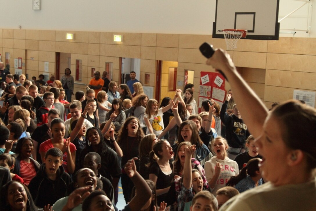 (Left to Right) SSgt Robert Browning, SSgt Sam Kennedy, and SSgt Matthew Peacock connect with Wiesbaden Middle School students.  Touch n' Go performs for Community and Educational Outreach missions as well as official military functions throughout the European and African Theater.