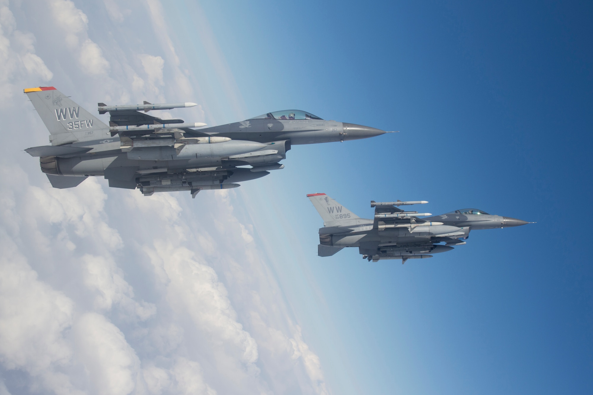 Two F-16 Fighting Falcons execute a training mission over Misawa Air Base, Japan, Feb. 14, 2013. Newly implemented training between pilots assigned to the 35th Fighter Wing and the Japan Ground Self-Defense Force provides a robust simulated combat environment. (Courtesy photo/released)