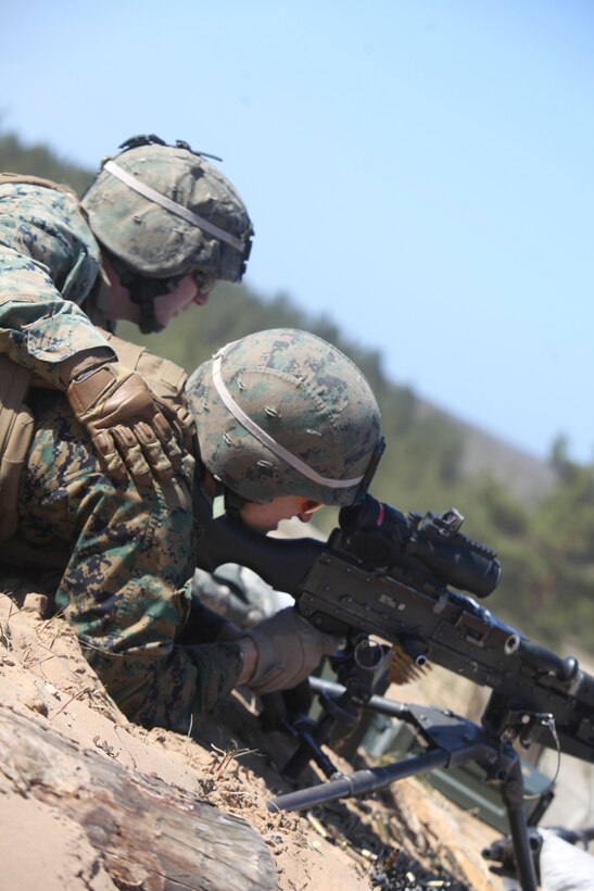 U.S. Marines and sailors with Black Sea Rotational Force 13 conduct live fire during exercie Summer Shield 10 aboard Camp Adazi, Latvia, April 24, 2013.  Exercise Summer Shield 10 focuses on integration of fires and maneuver in a joint environment to build partner nation capacity while enhancing our interoperability between the United States, Lithuania, Estonia, and Latvia. (U.S. Marine Corps photo by SSgt David Rakes, Sr./released)