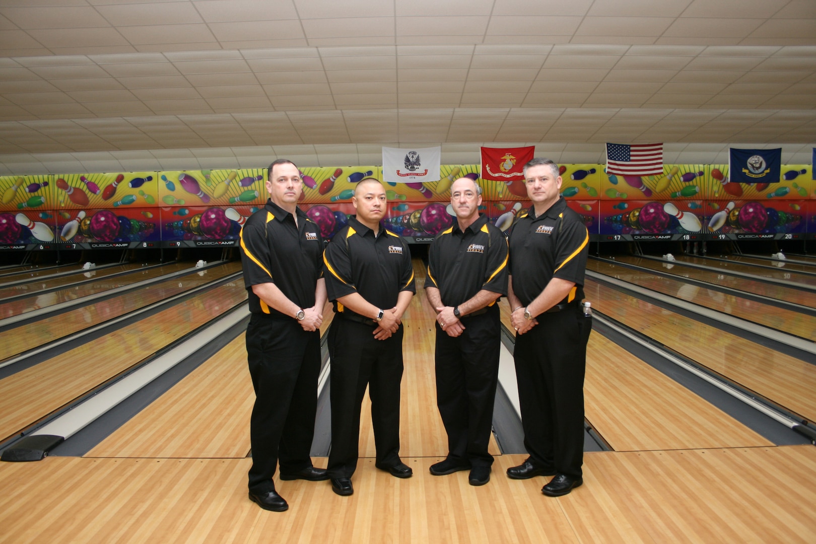 U.S. Army Men take their fourth consecutive bowling title at the 2013 Armed Forces Bowling Championship at MCB Camp Lejeune, NC.  MSG Daniel Lew, USAR-Dublin, CA takes overall gold and MSG Thomas Wynne, USAG Weisbaden, Germany takes silver