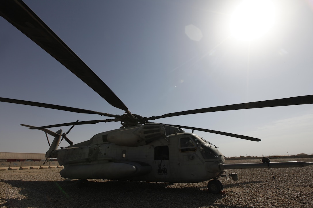 A CH-53E aircraft is staged during Guardian Rescue at Camp Leatherneck, Helmand province, Afghanistan April 27, 2013. Guardian Rescue was a simulated crash exercise conducted to familiarize personnel with their roles and responsibilities. (U.S. Marine Corps photo by Sgt. Gabriela Garcia/Released)