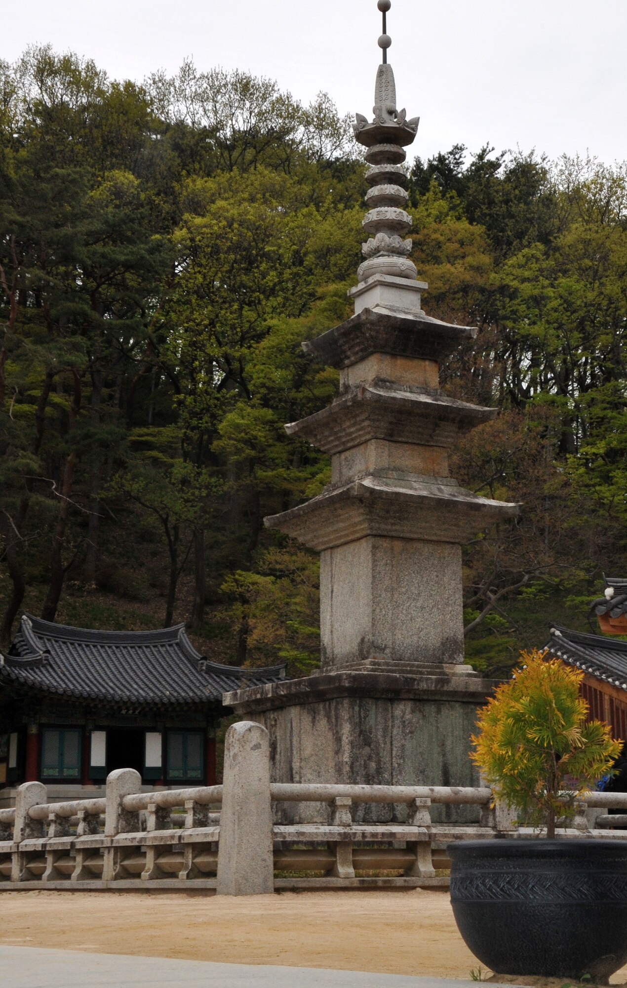 One of two three-story pagodas stand in front of the Daeungjeon, the main Buddha hall of the Hwangaksan Jikjisa Temple, a highlight of the Information, Tickets and Travel trip April 27, 2013. The two pagodas were brought to Jikjisa in 1974 from Mungyeoung City, and sit to the east and west of the hall.  (U.S. Air Force photo/Senior Airman Kristina Overton)