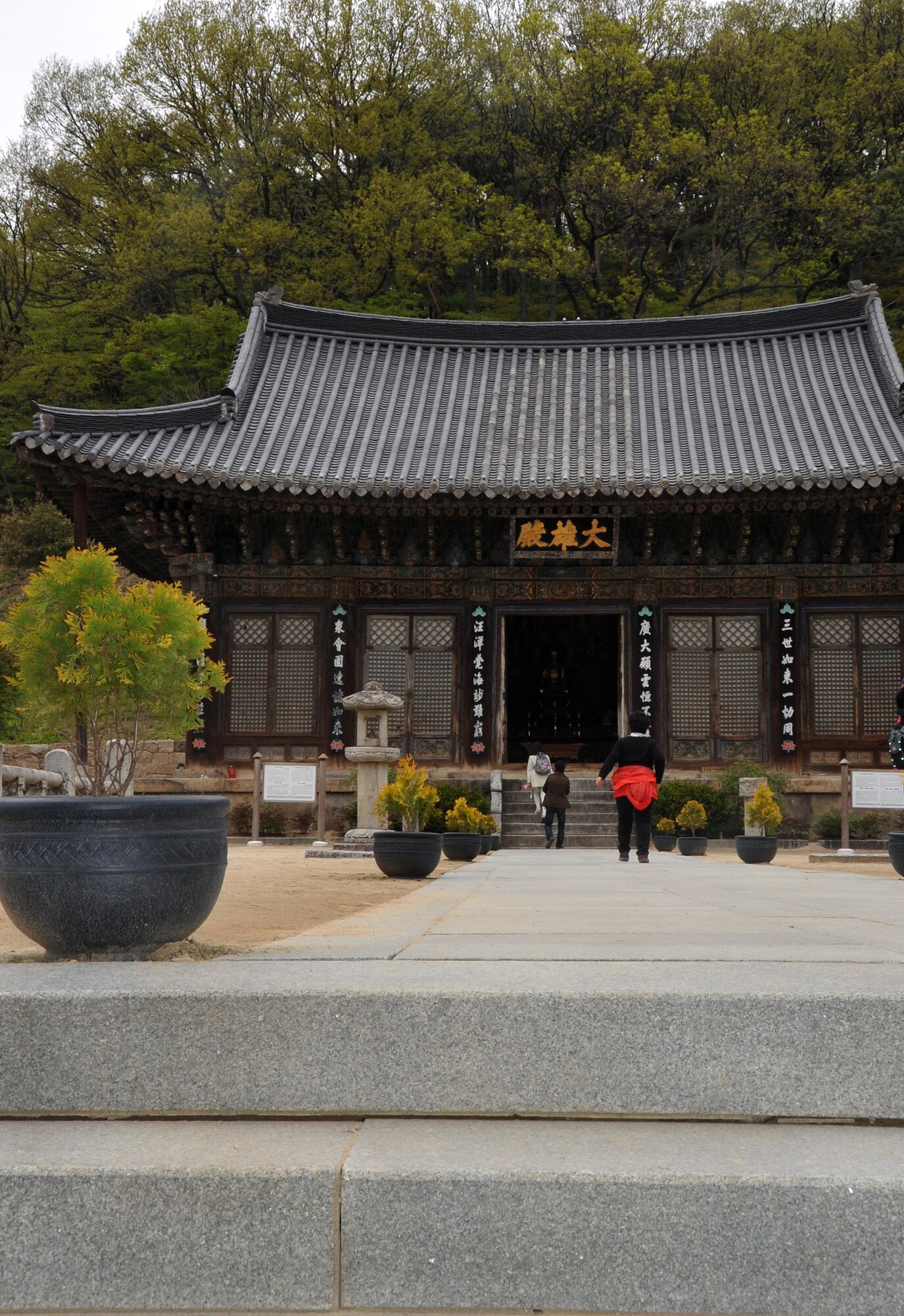 The Daeungjeon is the main Buddha hall of the Hwangaksan Jikjisa Temple, a highlight during the Information, Tickets and Travel trip April 27, 2013. The structure was originally a two-story building during the Joseon Dynasty, but was destroyed during the Japanese invasion and restored in 1735. Paintings on the interior feature the celestial kings and guardian gods of love and compassion, the Sea King and a child, important figures in the Buddhist faith. (U.S. Air Force photo/Senior Airman Kristina Overton)