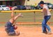 U.S. Air Force Master Sgt. Mike Grawe, 7th Force Support Squadron first sergeant, catches the ball as his opponent touches second base during a kickball tournament April 24, 2013, at Dyess Air Force Base, Texas. During the first game of the tournament, Marine Corps Reserve Detachment 1 outscored the Dyess first sergeants, allowing them to move to the next round. (U.S. Air Force photo by Senior Airman Cierra Presentado/Released)