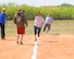 U.S. Air Force Master Sgt. Jennifer Weiss, center, 7th Communications Squadron first sergeant, runs toward home plate during a kickball tournament April 24, 2013, at Dyess Air Force Base, Texas.  Teams from the 7th Munitions Squadron, Dyess first sergeants and Dyess Marine Corps Detachment 1 participated in the tourney. (U.S. Air Force photo by Senior Airman Cierra Presentado/Released)
