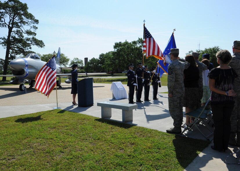 Members of Team Moody gather for the F-86L Sabre dedication ceremony at Moody Air Force Base, Ga., April 27, 2013. Among the attendants were family members of U.S. Air Force Maj. Lyn McIntosh, former rescue pilot killed during Operation Eagle Claw  in 1980, who were there for the rededication  of the F-86 that served as a memorial for McIntosh in Valdosta, Ga. (U.S. Air Force photo by Senior Airman Eileen Meier/Released)
