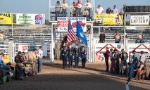 Honor Guard members from Laughlin Air Force Base, Texas, present the colors as the competition’s bull riders show their respect during the opening ceremony of the 36th annual George Paul Memorial Bull Riding competition at the Val Verde County Fairgrounds in Del Rio, Texas, April 27, 2013. The George Paul Memorial Bull Riding competition showcased some of the nation’s top professional bull riders in a two-day competition. (U.S. Air Force photo/Senior Airman Nathan Maysonet)