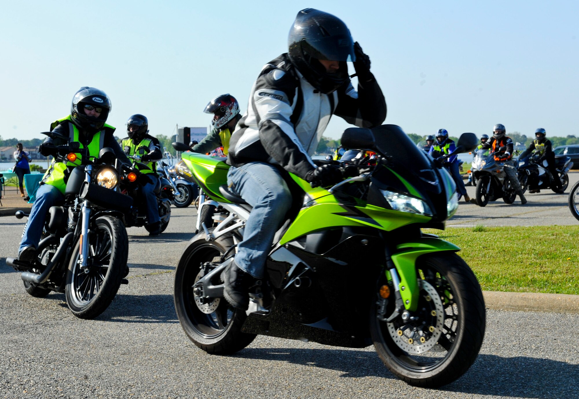 Motorcyclists depart for the Standing Together against Rape ride during Sexual Assault Awareness Month at Langley Air Force Base, Va., April 22, 2013. More than 70 bikers from Joint Base Langley-Eustis participated in the ride. (U.S. Air Force photo by Airman 1st Class Kimberly Nagle/Released)
