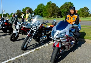 U.S. Air Force Master Sgt. Nakisha Turner, Air Combat Command 589th executive liaison, prepares for the Standing Together against Rape ride at Langley Air Force Base Va., April 22, 2013. The event was just one of many events that took place in support of Sexual Assault Awareness Month. (U.S. Air Force photo by Airman 1st Class Kimberly Nagle/Released)