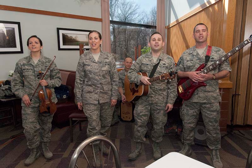 Celtic Aire, one of The U.S. Air Force Band’s small ensembles, performs during a special meal at Freedom Hall Dining Facility on Joint Base Andrews, Md. April 6, 2013. The free meal was held in honor of currently-deployed service members and their families. (Photo/Bobby Jones)