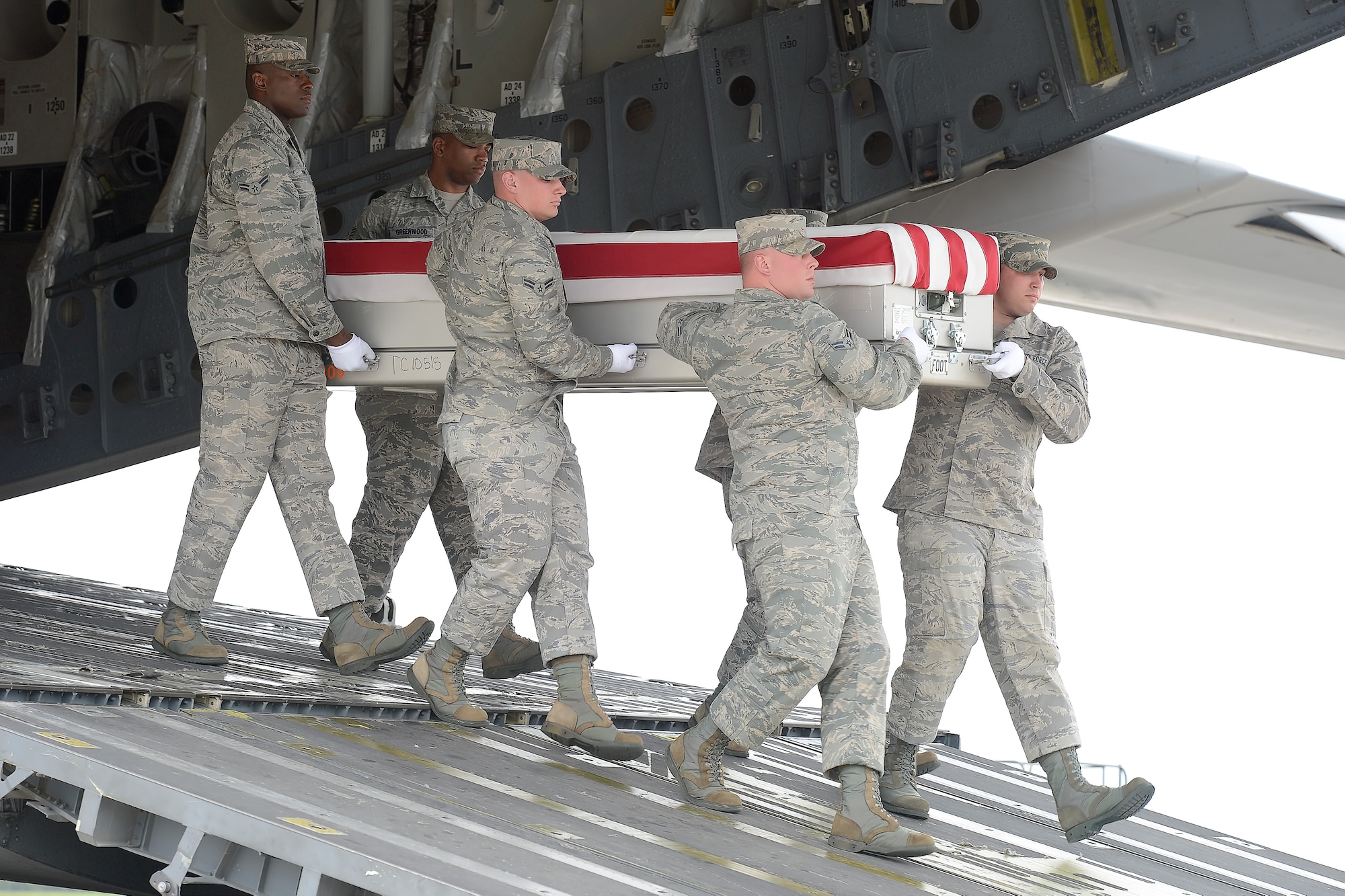 A U.S. Air Force carry team transfers the remains of Capt. Brandon L. Cyr, of Woodbridge, Va., during a dignified transfer April 30, 2013 at Dover Air Force Base, Del. Cyr was assigned to the 906th Air Refueling Squadron, Scott AFB, Ill. (U.S. Air Force photo/Greg L. Davis)