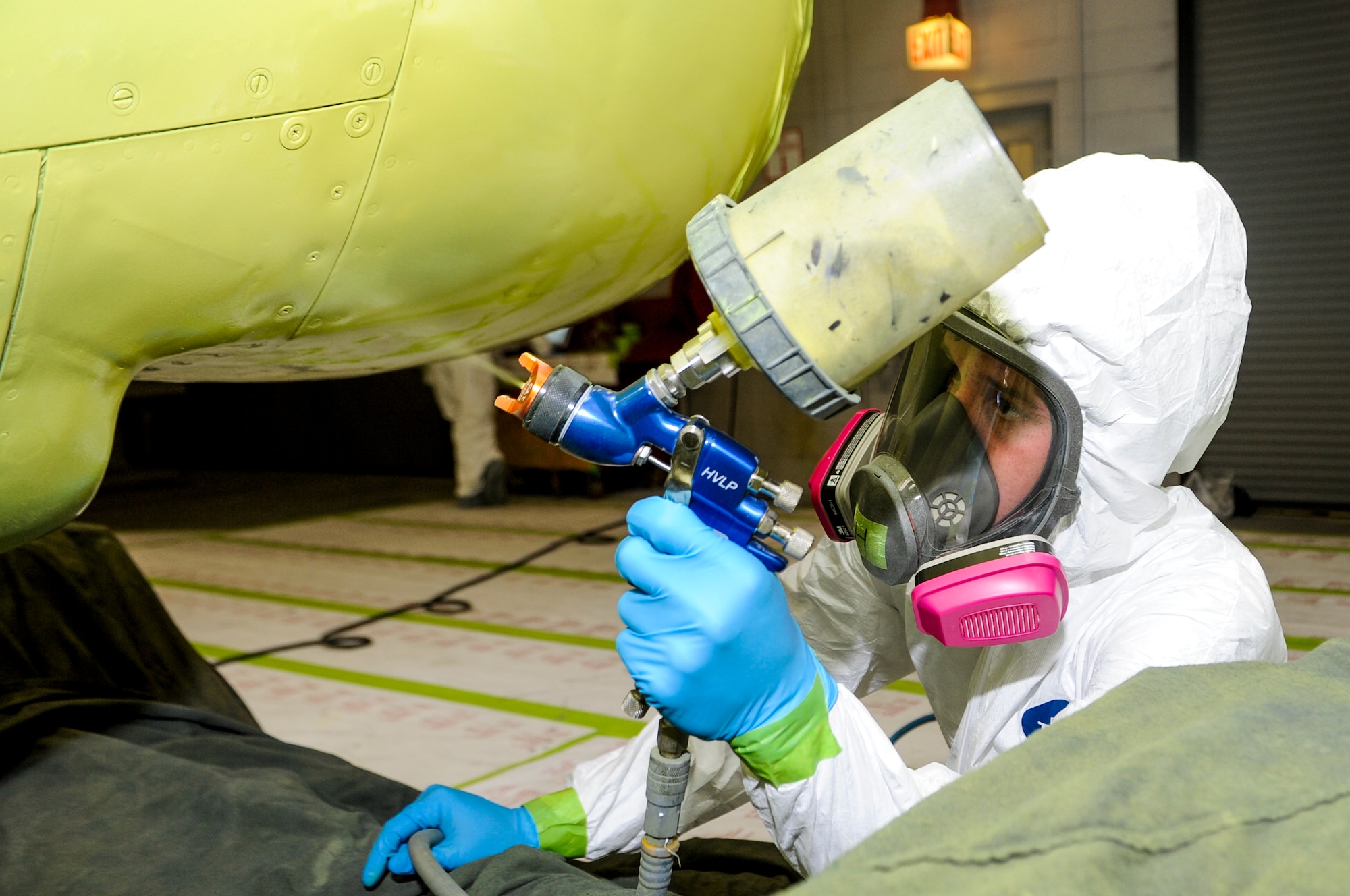 U.S. Air Force Senior Airman Patrick Hanrahan, aircraft structural maintainer from Fabrication Flight, 1st Special Operations Equipment Maintenance Squadron, uses a paint spray gun to add a coating of primer on a C-130 engine at the Corrosion Control Facility on Hurlburt Field, Fla., April 25, 2013. The 1 SOEMS is dedicated to providing the 1st Special Operations Wing with the best quality in maintenance and ensuring the wing can accomplish its mission any time, any place. (U.S. Air Force photo/Airman 1st Class Christopher Callaway)