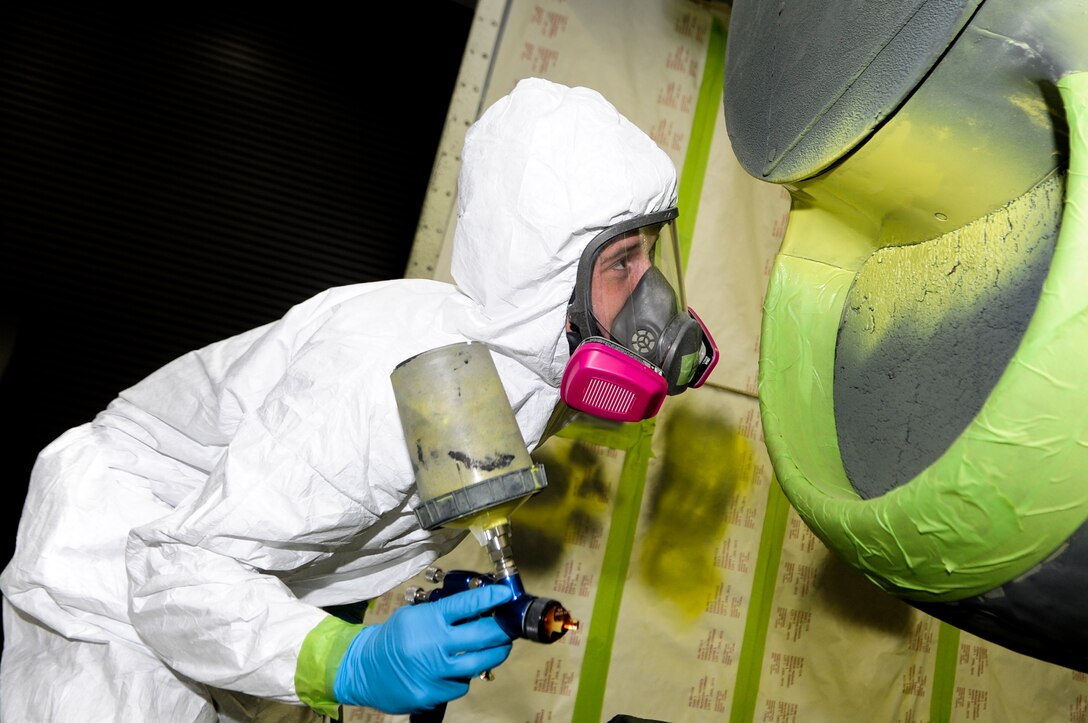 U.S. Air Force Senior Airman Patrick Hanrahan, aircraft structural maintainer from Fabrication Flight, 1st Special Operations Equipment Maintenance Squadron, inspects the primer on a C-130 engine at the Corrosion Control Facility on Hurlburt Field, Fla., April 25, 2013. The Airmen from 1 SOEMS add primer to the equipment and then add a normal gray color to match the rest of the aircraft. (U.S. Air Force photo/Airman 1st Class Christopher Callaway)