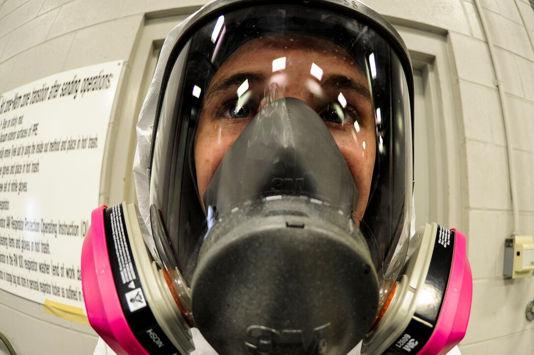 U.S. Air Force Senior Airman Timothy Jones, aircraft structural maintainer from Fabrication Flight, 1st Special Operations Equipment Maintenance Squadron, prepares to sand equipment at Corrosion Control Facility on Hurlburt Field, Fla., April 24, 2013. The flight is essential to the repair and restoration of metal, fiberglass and fabric material. (U.S. Air Force photo/Airman 1st Class Christopher Callaway)