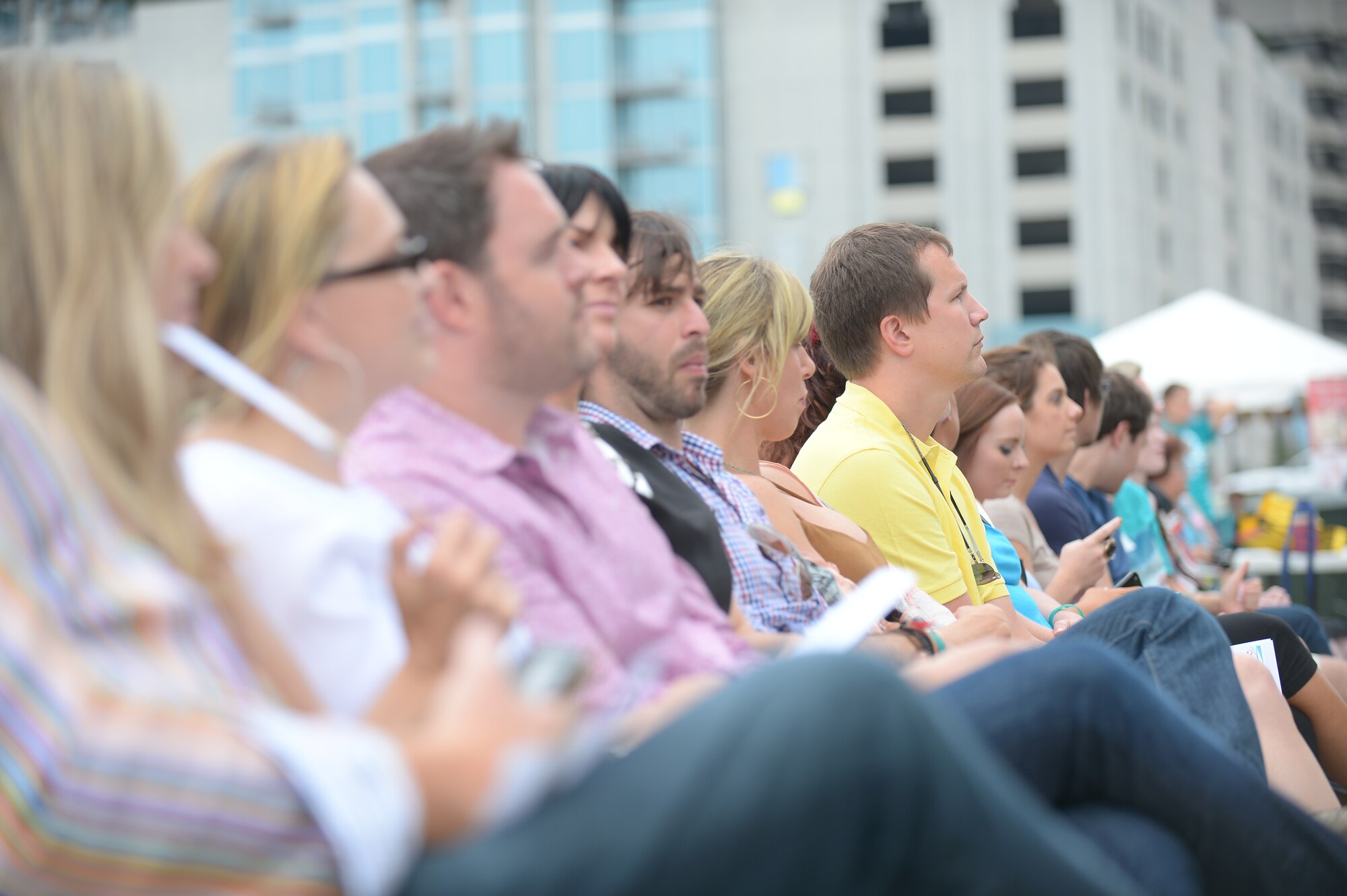 Members of the Tampa Bay community listen to speakers including Col. Scott DeThomas, 6th Air Mobility Wing commander, April 21, 2013 during the annual Take Back the Night event. Take Back the Night is intended to educate the community with hopes of ending sexual violence. (U.S. Air Force photo by Airman 1st Class Sarah Breer/released)