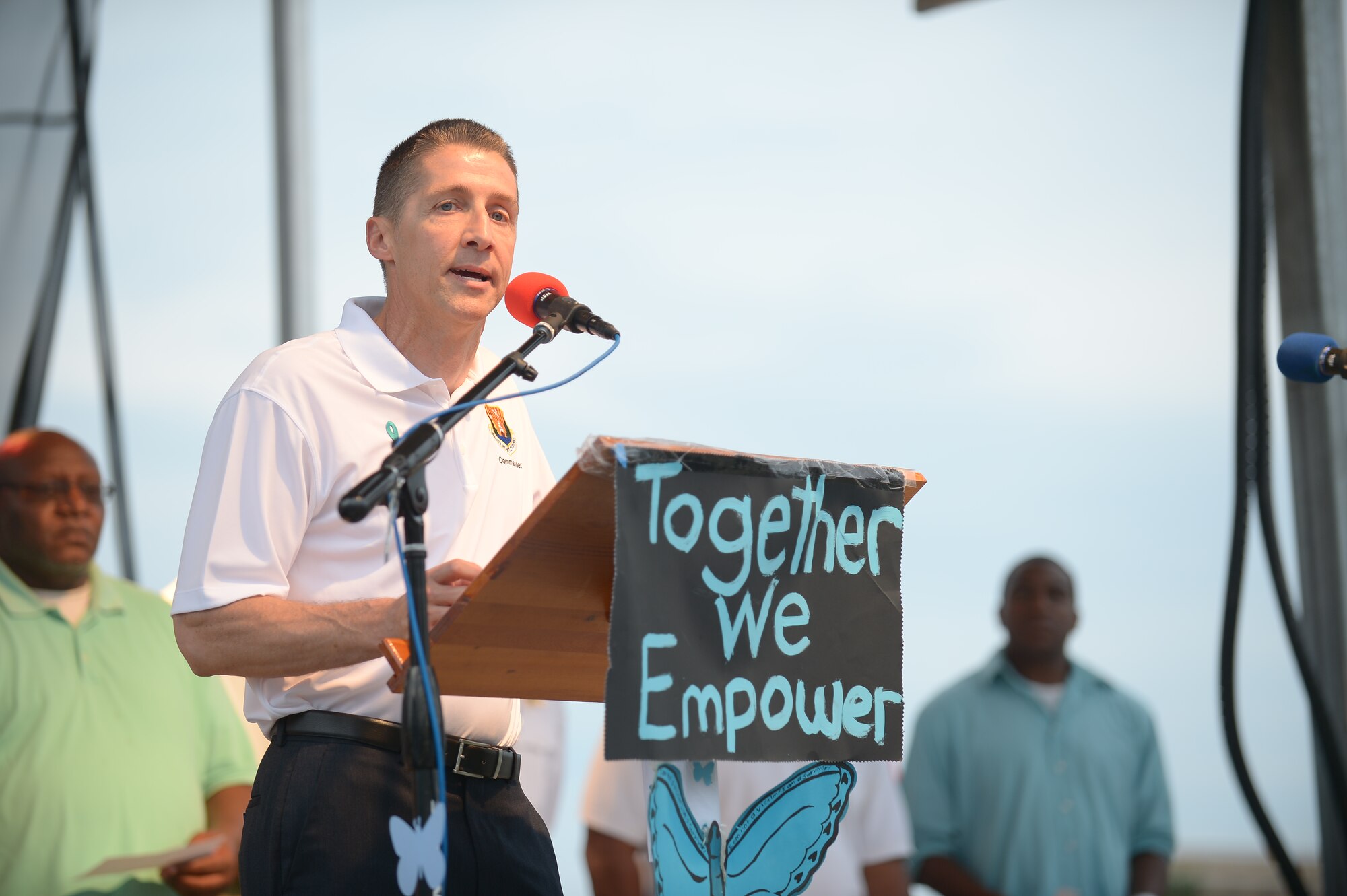 Col. Scott DeThomas, 6th Air Mobility Wing commander, speaks to Tampa Bay community members April 21, 2013 during the annual Take Back the Night event. DeThomas assured those in attendance that MacDill Air Force Base would continue to enforce it's zero tollerance policy on sexual violence. (U.S. Air Force photo by Airman 1st Class Sarah Breer/released)