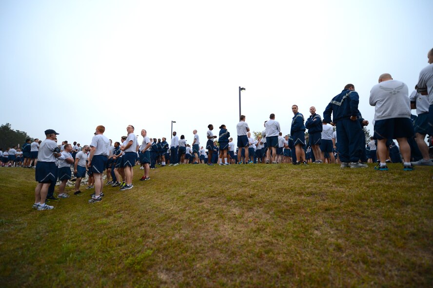 Airmen, Soldiers and dependents gather for a sexual assault prevention run at the Fitness Center Annex, Shaw Air Force Base, S.C., April 26, 2013.  The three-mile run had more than 300 participants and kicked off the 20th Fighter Wing’s Comprehensive Airmen Fitness Day.  (U.S. Air Force photo by Airman 1st Class Nicole Sikorski/Released)