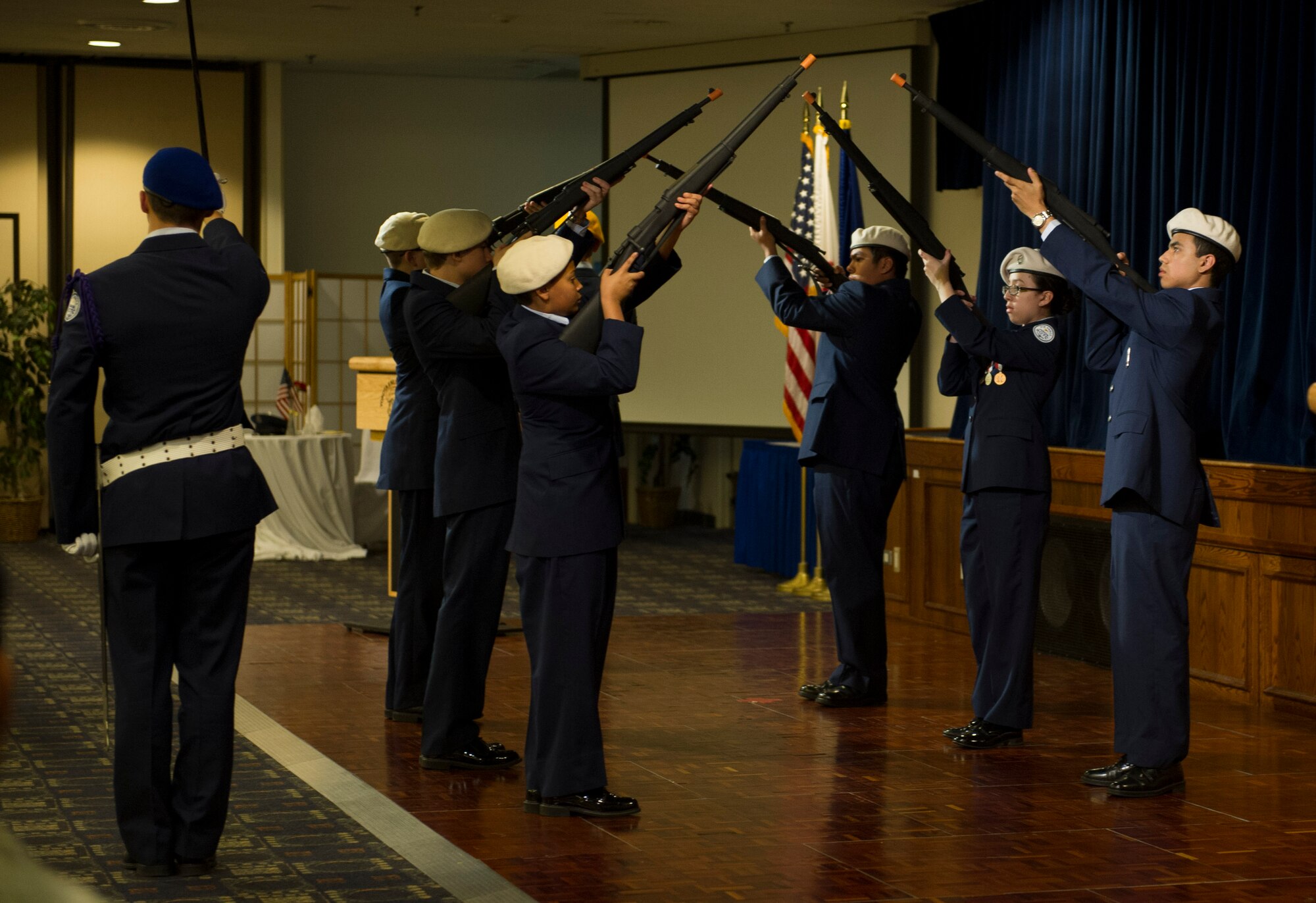 YOKOTA AIR BASE, Japan -- Yokota High School's Junior Reserve Officer Training Corps and Civil Air Patrol members conduct a drill performance during the 2013 Honor Guard Recognition Banquet, April 26, 2013, at Yokota Air Base, Japan. The drill was performed in honor and recognition of Yokota's honor guard members, past, present and future. (U.S. Air Force photo by Senior Airman Andrea Salazar/Released)