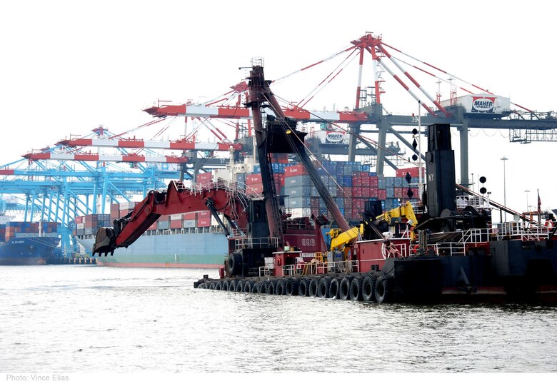 The dredge 'New York' performs dredging for the U.S. Army Corps of Engineers in the Port Jersey Channel, New Jersey. The Corps' New York District has been deepening the shipping channels in the New York /New Jersey Harbor to 50 feet to accommodate larger, deeper-draft ships.  This will improve navigational safety and allow the port to accommodate the next generations of larger cargo vessels.