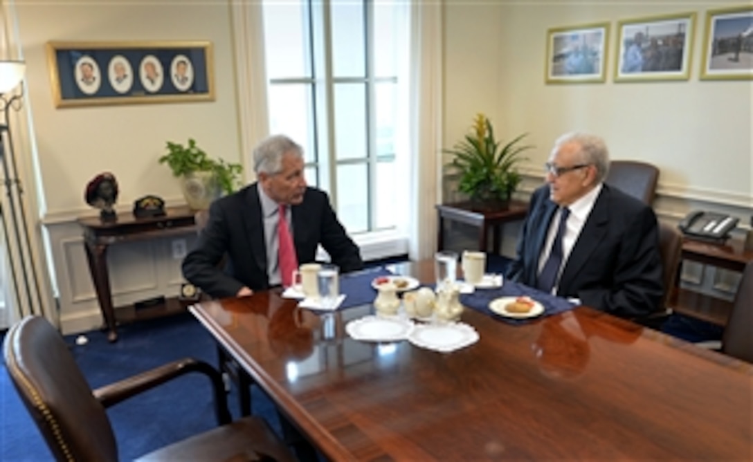 Secretary of Defense Chuck Hagel, left, meets with Ambassador Lakhdar Brahimi, the Joint Arab League-UN Special Representative for Syria, in Hagel’s Pentagon office on April 29, 2013.  Hagel and Brahimi discussed the United States’ efforts to provide humanitarian relief to the Syrian people. They also exchanged views on the military effectiveness of the Syrian opposition and the role its leaders might play in a political transition