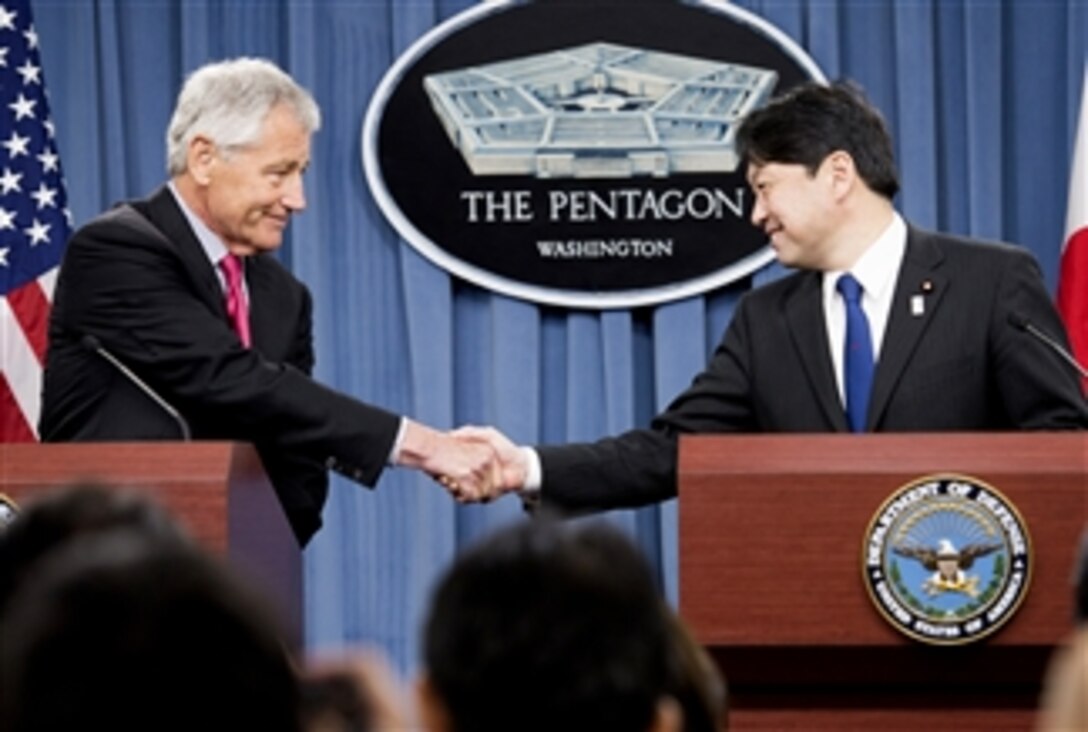 Secretary of Defense Chuck Hagel, left, and Japan's Minister of Defense Itsunori Onodera shake hands before the beginning of their joint press conference in the Pentagon on April 29, 2013.  Hagel and Onodera briefed the press on the substance of their earlier meeting where they discussed U.S.-Japanese security concerns.  