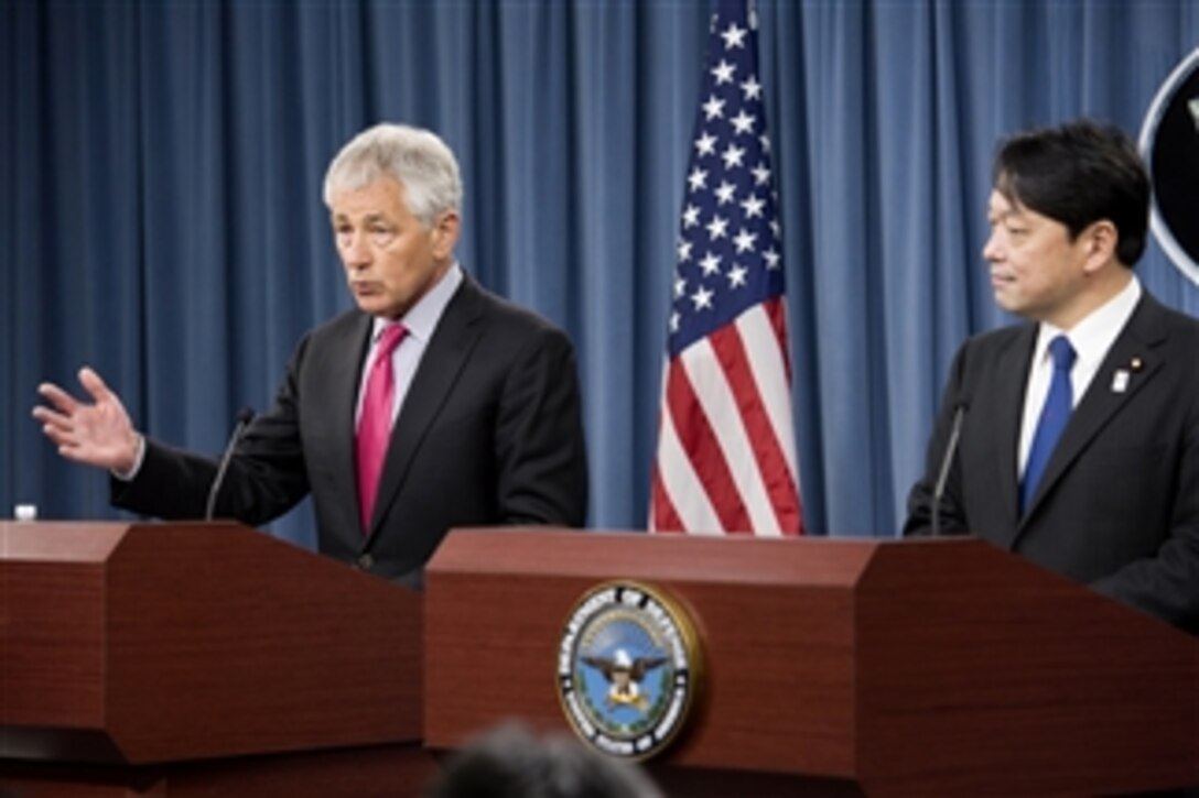 Secretary of Defense Chuck Hagel, left, answers a reporter’s question during a joint press conference with Japan's Minister of Defense Itsunori Onodera in the Pentagon on April 29, 2013.  Hagel and Onodera briefed the press on the substance of their earlier meeting where they discussed U.S.-Japanese security concerns.  