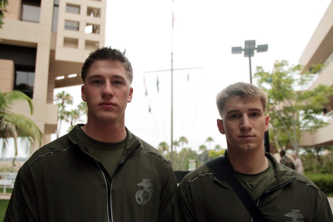NAVAL MEDICAL CENTER SAN DIEGO, Calif. – Corporal Matthew S. Babler, left, and Lance Cpl. Justin R. Beer, riflemen temporarily assigned to Wounded Warrior Battalion West, were presented the Purple Heart for injuries sustained from sniper fire while deployed with 3rd Battalion, 4th Marine Regiment, to Musa Qal’ah district, Helmand province, Afghanistan, in support of Operation Enduring Freedom. Major Gen. Lawrence D. Nicholson, 1st Marine Division commanding general, and a native of Toronto, presented the medals to Babler, a native of Monticello, Wisc., and Beer, a native of Bushnell, Ill., during an award ceremony here, July 31, 2013.
(U.S. Marine Corps photo by Sgt. Jacob H. Harrer)