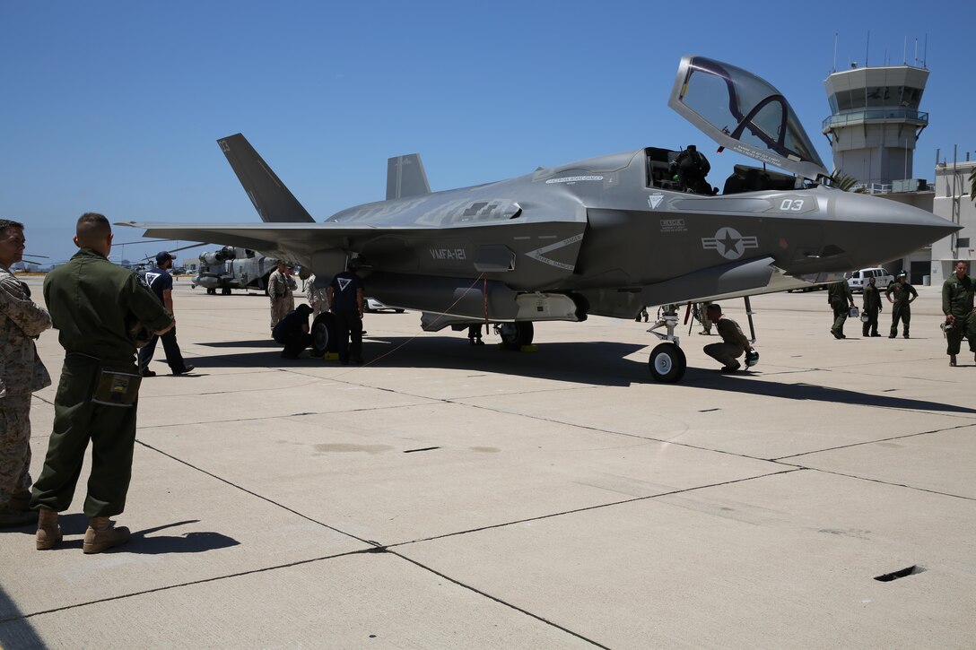 Marines view an F-35B Lightning II from Marine Fighter Attack Squadron 121, Marine Corps Air Station Yuma, Ariz., aboard MCAS Miramar, Calif., July 30. The Lightning II is the Marine Corps’ newest aircraft and is capable of short take-off and vertical landing.


