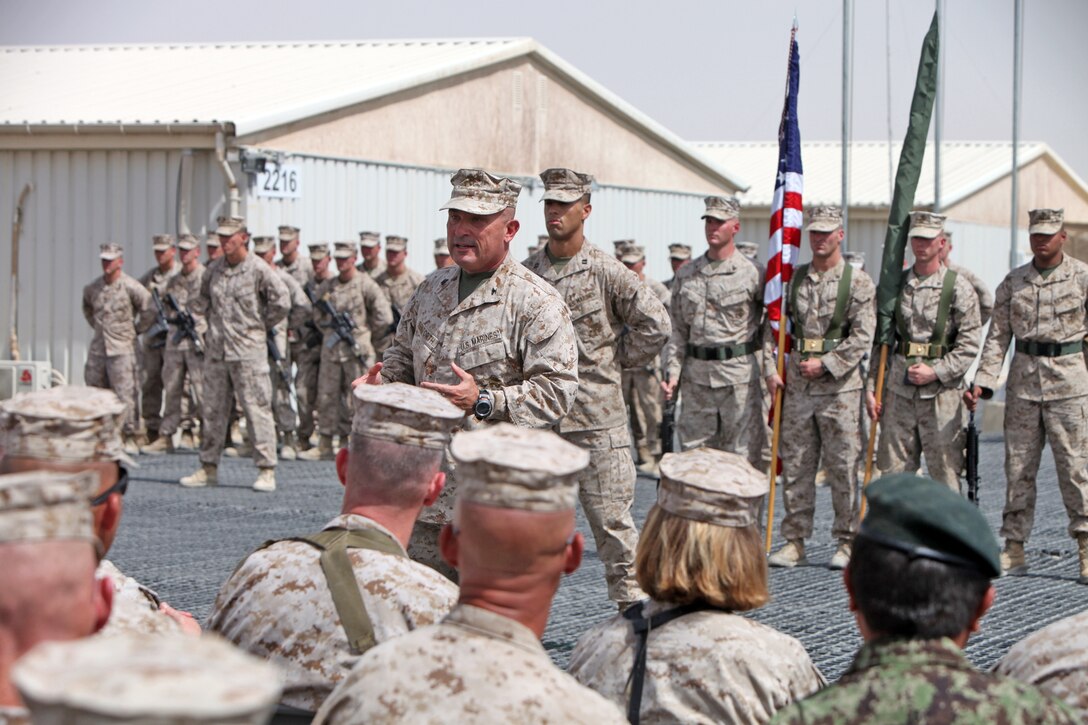 Col. A. E. "Sparky" Renforth, Regimental Combat Team 7 commanding officer, talks to Marines and coalition forces during the casing of the colors ceremony here, July 31, 2013. "I say all the time, 'It's amazing what you can do when you don't care who gets the credit,'" Renforth said. "That's what our Marines have lived by, and they all know that they made a difference."