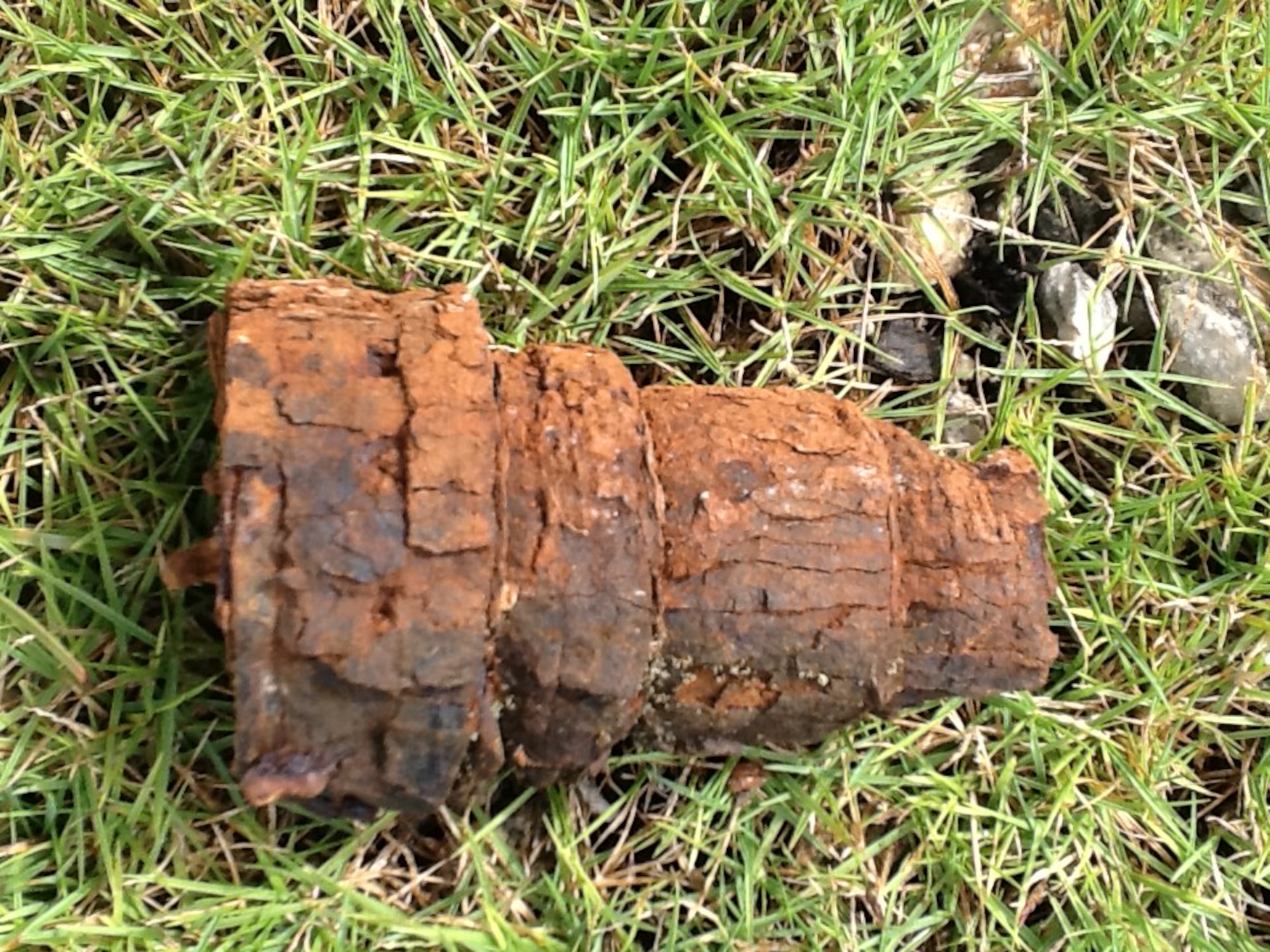 36th Civil Engineer Squadron Explosive Ordnance Disposal Airmen responded to this unexploded ordnance from World War II May 21, 2013, on Andersen Air Force Base, Guam. Members are advised to contact emergency officials immediately and set up a 50-foot cordon in the event a UXO is found. (Courtesy photo)