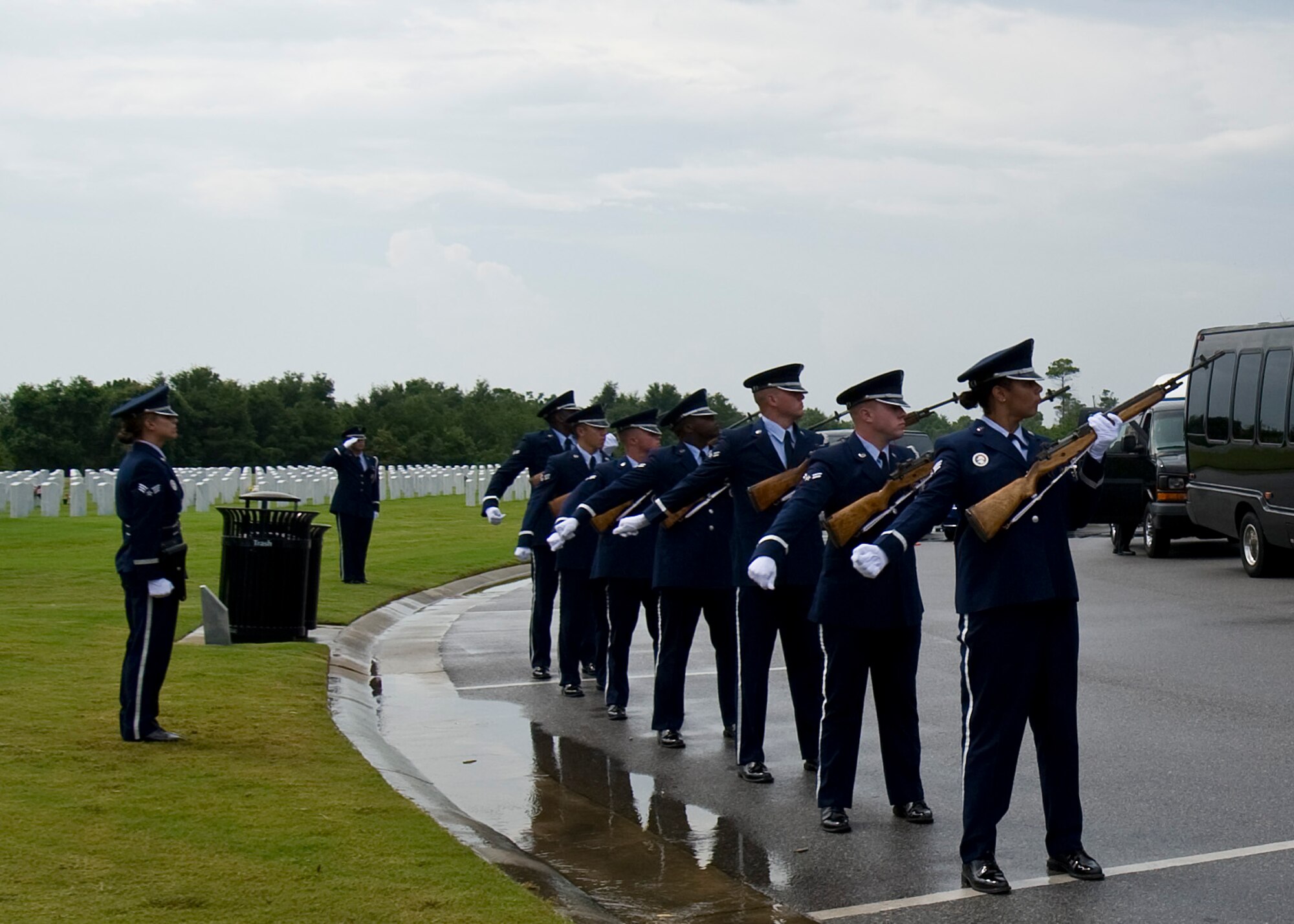 The Hurlburt Field Honor Guard firing team performs the 21-gun salute at the funeral service for retired U.S. Air Force Col. George “Bud” Day’s funeral service at Barrancas National Cemetery on Naval Air Station Pensacola, Fla., Aug. 1, 2013. Day, a Medal of Honor recipient and combat pilot with service in World War II, Korea and Vietnam, passed away July 28 at the age of 88. (U.S. Air Force Photo/Staff Sgt. John Bainter)