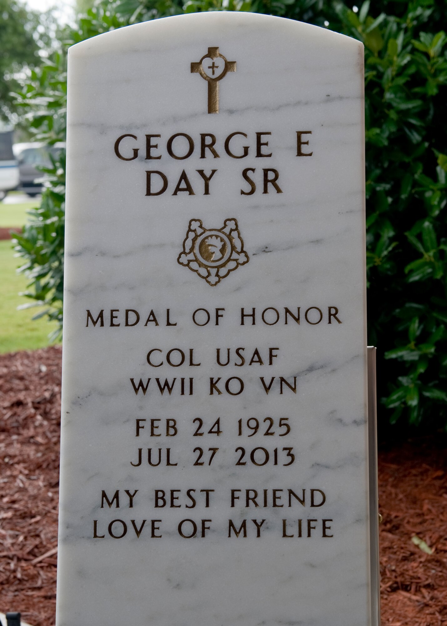 Retired U.S. Air Force Col. George “Bud” Day’s gravestone sits on display during his funeral service at the Barrancas National Cemetery on Naval Air Station Pensacola, Fla., Aug. 1, 2013. Day, a Medal of Honor recipient and combat pilot with service in World War II, Korea and Vietnam, passed away July 28 at the age of 88. (U.S. Air Force Photo/ Airman 1st Class Jeffrey Parkinson)
