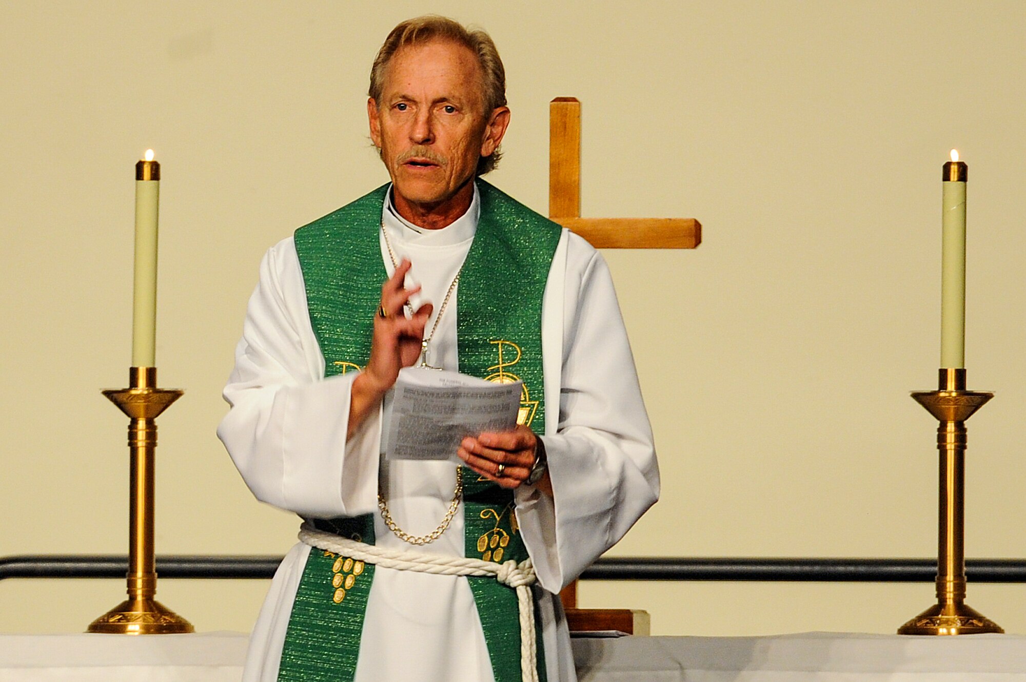 The officiating Priest during a memorial service for retired U.S. Air Force Col. George “Bud” Day speaks to the crowd at the Emerald Coast Convention Center on Okaloosa Island, Fla., Aug. 1. Day, a Medal of Honor recipient and combat pilot with service in World War II, Korea and Vietnam, passed away July 28 at the age of 88. (U.S. Air Force Photo / Airman 1st Class Christopher Callaway)