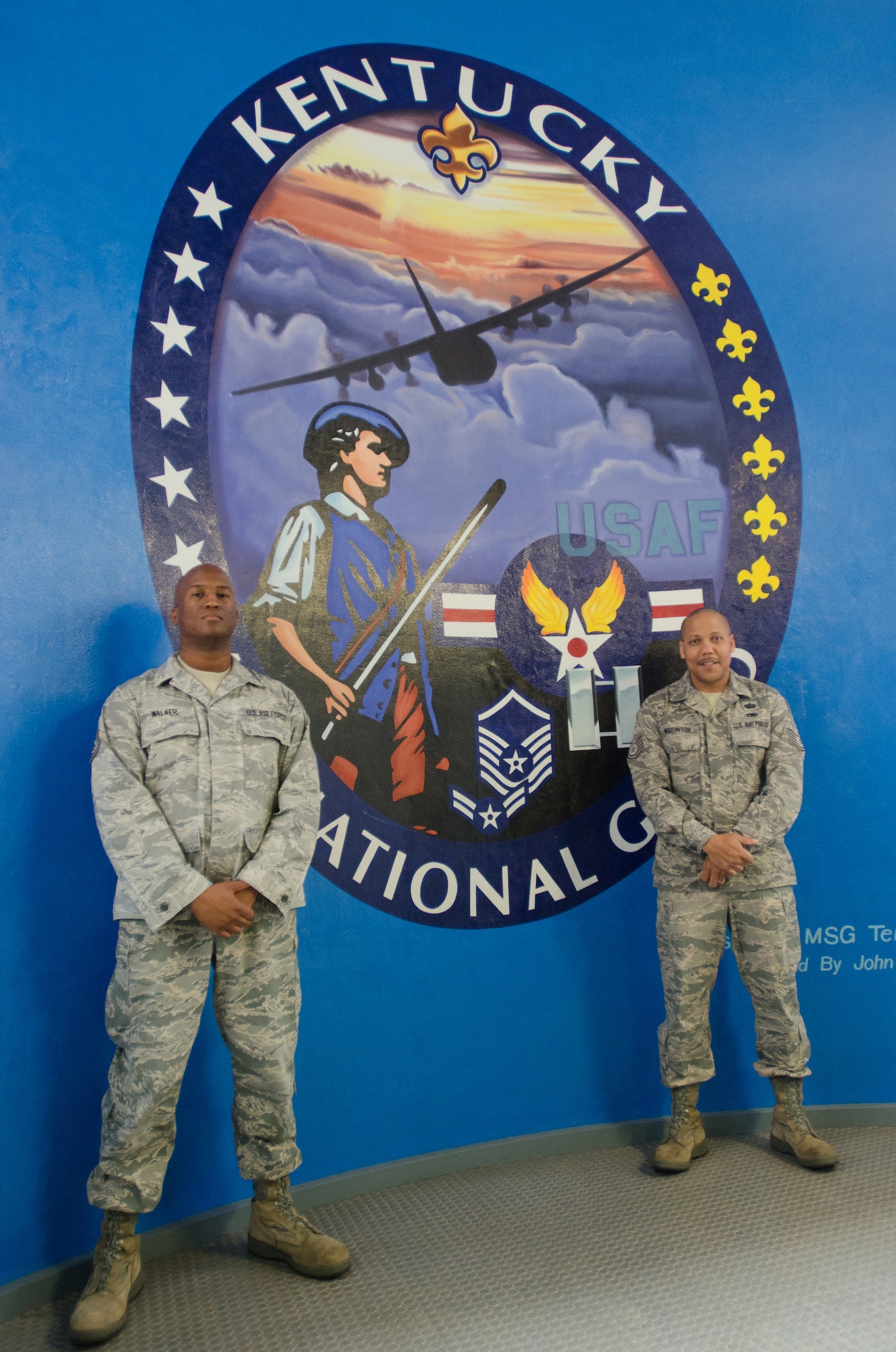 Tech. Sgt. Anthony Walker (left) and Tech. Sgt. Lawrence Wigginton, recruiters in the Kentucky Air National Guard's 123rd Airlift Wing, recently won the national "Medicine Man" recruiting award and the Region IV "Top Rookie Recruiter of the Year" award for 2012, respectively. Both recruiters are now eligible to wear the Recruiter Gold Badge on their service dress uniforms as an indicator of excellent performance. (U.S. Air National Guard photo by Master Sgt. Phil Speck)