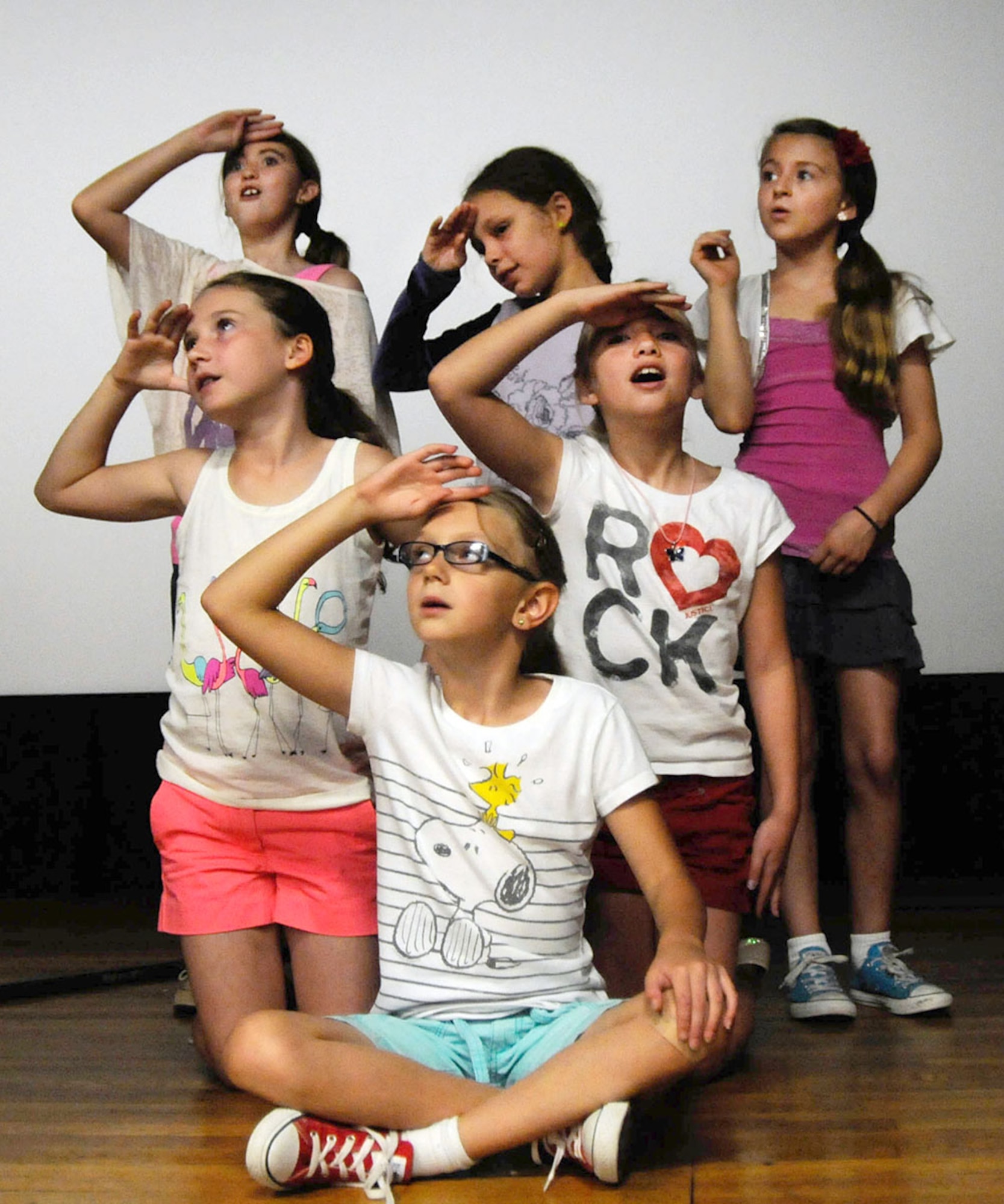 HANSCOM AIR FORCE BASE, Mass. -- Children rehearse a scene from the Secret Garden at the Base Theater July 30. The children rehearsed throughout the week under the direction of the Missoula Children’s Theatre unique international touring project. Live performances will be open to the base community Aug. 3 at 10 a.m. and 2 p.m. at the theatre. (U.S. Air Force photo by Linda LaBonte Britt)