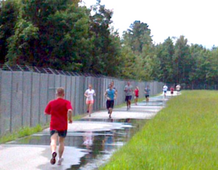 Airmen from the 916th Air Refueling Wing run in July as part of the Shell 77 run to support the families of the fallen crew members whose KC-135R Stratotanker crashed in Kyrgyzstan earlier this year. (USAF photo courtesy of Ashly Peek)