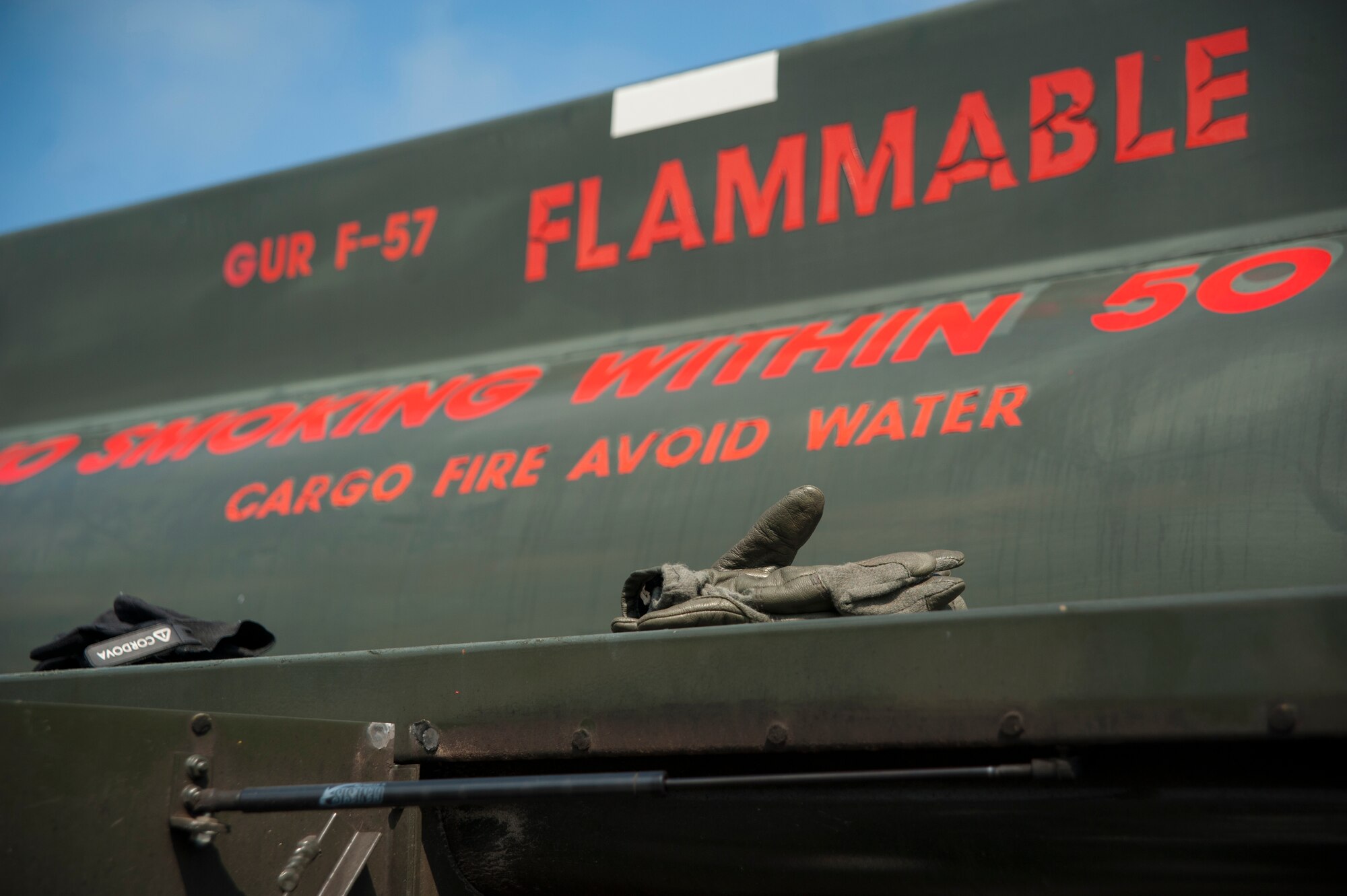 Every Tuesday and Thursday, Airmen from the 628th LRS POL fuel service vehicles with motor oil gas or DS-2 diesel fuel at Joint Base Charleston- Weapons Station, S.C. POL fuels supplies JB Charleston vehicles with fuel, including rail operations, cranes on Wharf Alpha to offload ships, port operations on the water, the 628th Security Forces Squadron and the U.S. Coast Guard. The 628th LRS has been providing this service since October 2010. A new service station is under construction at the Weapons Station and is scheduled to open later this year. (U.S. Air Force photo/Senior Airman Ashlee Galloway)