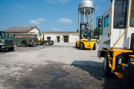 Customers line up to be serviced with DS-2 diesel fuel July 25, 2013, at Joint Base Charleston- Weapons Station, S.C. POL fuels supplies JB Charleston vehicles with fuel, including rail operations, cranes on Wharf Alpha to offload ships, port operations on the water, the 628th Security Forces Squadron and the U.S. Coast Guard. The 628th LRS has been providing this service since October 2010. A new service station is under construction at the Weapons Station and is scheduled to open later this year. (U.S. Air Force photo/Senior Airman Ashlee Galloway)