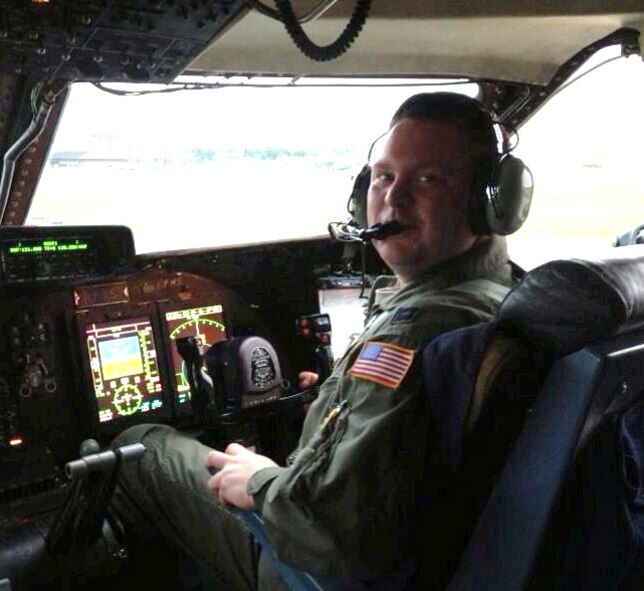 Capt. Jeremy Hooper, a 68th Airlift Squadron pilot, sits at the controls of a C-5A Galaxy at Joint Base San Antonio-Lackland.  Hooper recently endowed a $25,000 scholarship under the Sul Ross Scholarship program at Texas A&M University in College Station, Texas to assist cadets in tuition costs. (Courtesy Photo) 